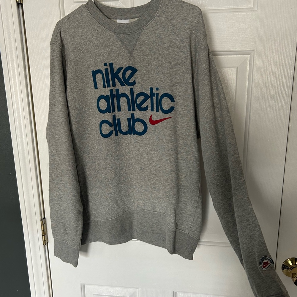 Nike Men's Gray Crewneck Sweater with Blue Logo